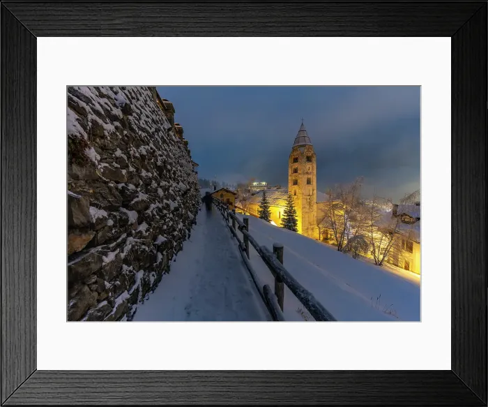 Framed Print : Church of Saint Pantalon and snow covered town centre and mountainous background in winter at dusk, Courmayeur, Aosta Valley, Italian Alps, Italy Framed Print : Church of Saint Pantalon and snow covered town centre and mountainous background in winter at dusk, Courmayeur, Aosta Valley, Italian Alps, Italy