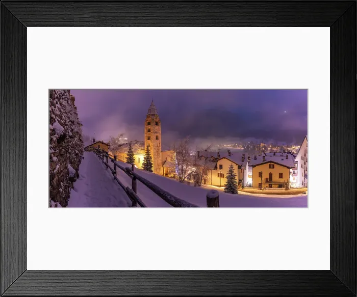 Framed Print : Church of Saint Pantalon and snow covered town centre and mountainous background in winter at dusk, Courmayeur, Aosta Valley, Italian Alps, Italy Framed Print : Church of Saint Pantalon and snow covered town centre and mountainous background in winter at dusk, Courmayeur, Aosta Valley, Italian Alps, Italy