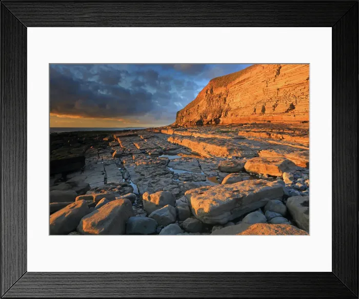 Framed Print : Golden evening light on the limestone cliffs, Dunraven Bay, Southerndown, Vale of Glamorgan, Wales, United Kingdom Framed Print : Golden evening light on the limestone cliffs, Dunraven Bay, Southerndown, Vale of Glamorgan, Wales, United Kingdom