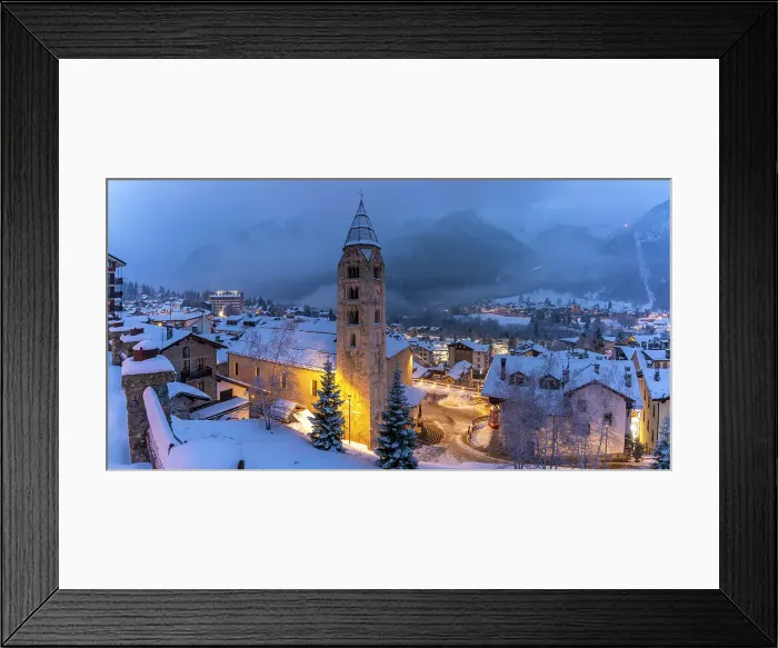 Framed Print : Church of Saint Pantalon, snow covered town centre and mountainous background in winter at dusk, Courmayeur, Aosta Valley, Italian Alps, Italy Framed Print : Church of Saint Pantalon, snow covered town centre and mountainous background in winter at dusk, Courmayeur, Aosta Valley, Italian Alps, Italy