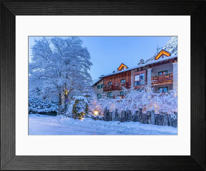 Framed Print : View of hotel and snow covered mountains in Courmayeur before dawn in winter, Courmayeur, Aosta Valley, Italian Alps, Italy Framed Print : View of hotel and snow covered mountains in Courmayeur before dawn in winter, Courmayeur, Aosta Valley, Italian Alps, Italy