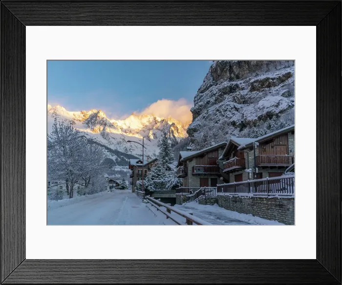 Framed Print : View of hotels, chalets and snow covered mountains in Courmayeur at sunrise in winter, Courmayeur, Aosta Valley, Italian Alps, Italy Framed Print : View of hotels, chalets and snow covered mountains in Courmayeur at sunrise in winter, Courmayeur, Aosta Valley, Italian Alps, Italy