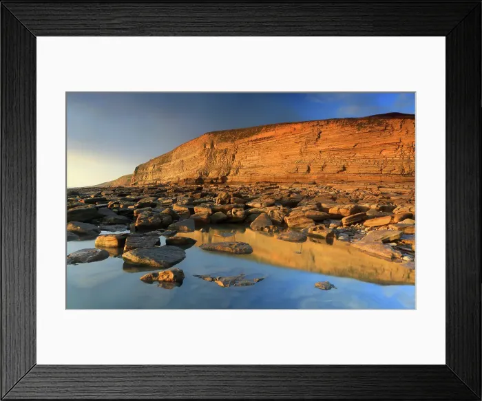 Framed Print : Golden evening light on the cliffs in winter at Dunraven Bay, Southerndown, Bridgend, South Wales, United Kingdom Framed Print : Golden evening light on the cliffs in winter at Dunraven Bay, Southerndown, Bridgend, South Wales, United Kingdom