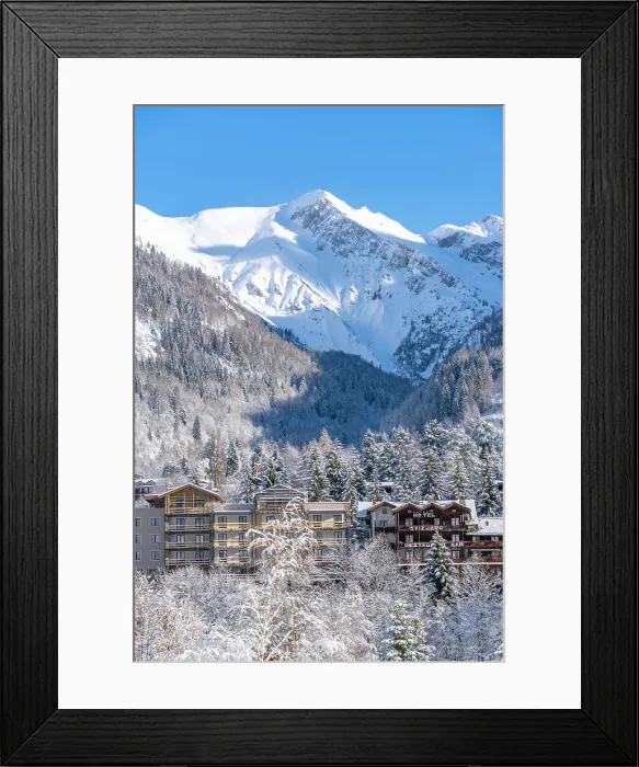 Framed Print : View of snow covered trees, mountains and Courmayeur from Dolonne in winter, Courmayeur, Aosta Valley, Italian Alps, Italy
