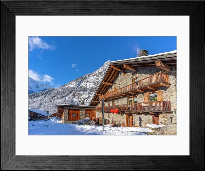 Framed Print : View of chalets and snow covered mountains in Courmayeur at sunrise in winter, Courmayeur, Aosta Valley, Italian Alps, Italy Framed Print : View of chalets and snow covered mountains in Courmayeur at sunrise in winter, Courmayeur, Aosta Valley, Italian Alps, Italy