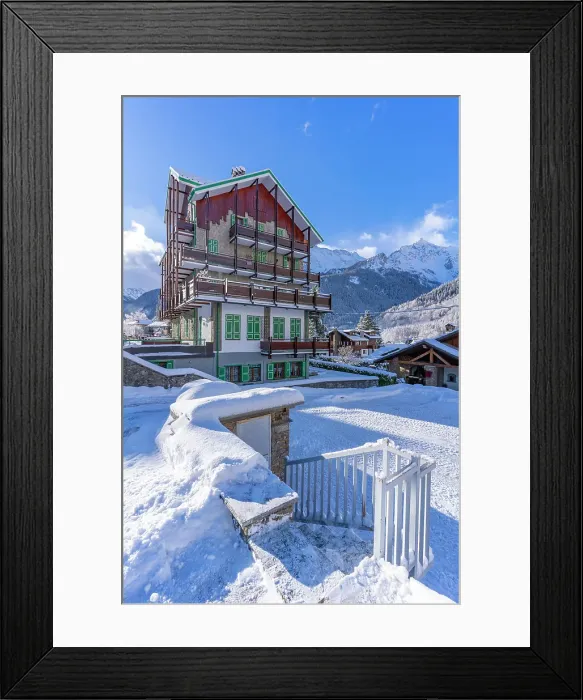 Framed Print : View of chalets and snow covered mountains in Courmayeur at sunrise in winter, Courmayeur, Aosta Valley, Italian Alps, Italy Framed Print : View of chalets and snow covered mountains in Courmayeur at sunrise in winter, Courmayeur, Aosta Valley, Italian Alps, Italy