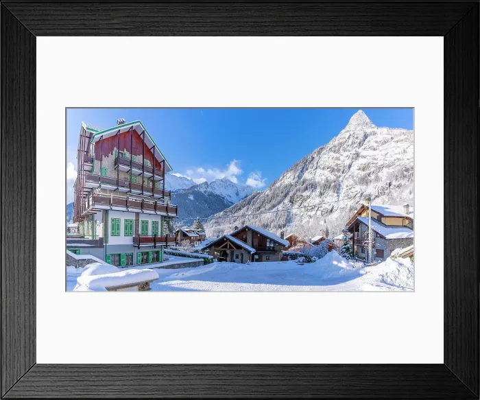 Framed Print : View of chalets and snow covered mountains in Courmayeur at sunrise in winter, Courmayeur, Aosta Valley, Italian Alps, Italy Framed Print : View of chalets and snow covered mountains in Courmayeur at sunrise in winter, Courmayeur, Aosta Valley, Italian Alps, Italy