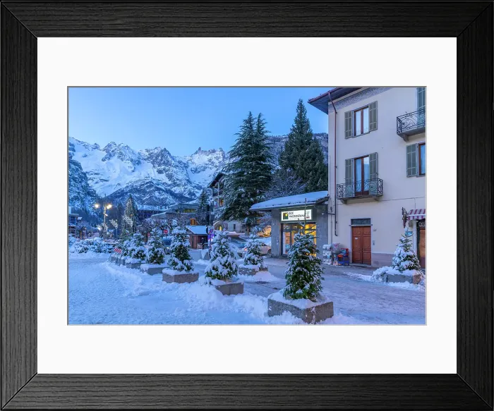 Framed Print : View of town centre and snow covered mountains in background at dusk, Courmayeur, Aosta Valley, Italian Alps, Italy Framed Print : View of town centre and snow covered mountains in background at dusk, Courmayeur, Aosta Valley, Italian Alps, Italy