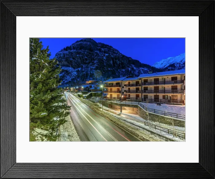 Framed Print : View of chalets and snow covered mountains in Courmayeur at dusk in winter, Courmayeur, Aosta Valley, Italian Alps, Italy Framed Print : View of chalets and snow covered mountains in Courmayeur at dusk in winter, Courmayeur, Aosta Valley, Italian Alps, Italy