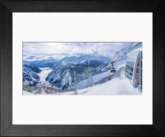 Framed Print : View of snow covered Aosta Valley, mountains and Skyway Monte Bianco cable car in winter, Courmayeur, Aosta Valley, Italian Alps, Italy Framed Print : View of snow covered Aosta Valley, mountains and Skyway Monte Bianco cable car in winter, Courmayeur, Aosta Valley, Italian Alps, Italy