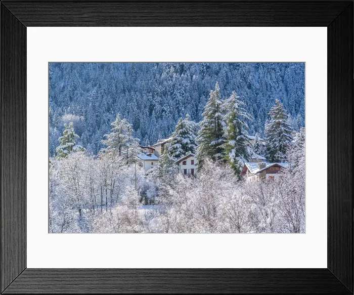 Framed Print : View of snow covered chalets, trees and mountains from Dolonne in winter, Courmayeur, Aosta Valley, Italian Alps, Italy Framed Print : View of snow covered chalets, trees and mountains from Dolonne in winter, Courmayeur, Aosta Valley, Italian Alps, Italy