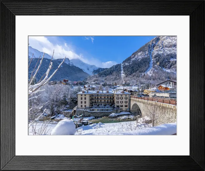 Framed Print : View of snow covered trees, mountains and Dolonne from Courmayeur in winter, Courmayeur, Aosta Valley, Italian Alps, Italy