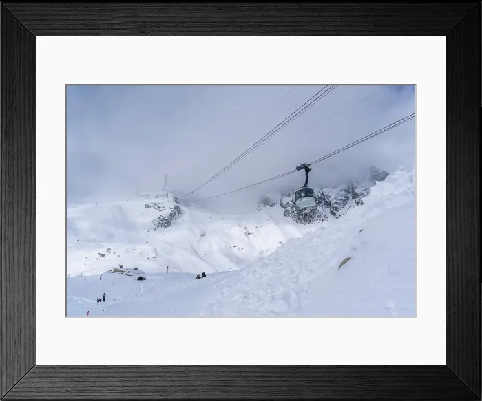 Framed Print : View of snow covered Aosta Valley, mountains and Skyway Monte Bianco cable car in winter, Courmayeur, Aosta Valley, Italian Alps, Italy Framed Print : View of snow covered Aosta Valley, mountains and Skyway Monte Bianco cable car in winter, Courmayeur, Aosta Valley, Italian Alps, Italy