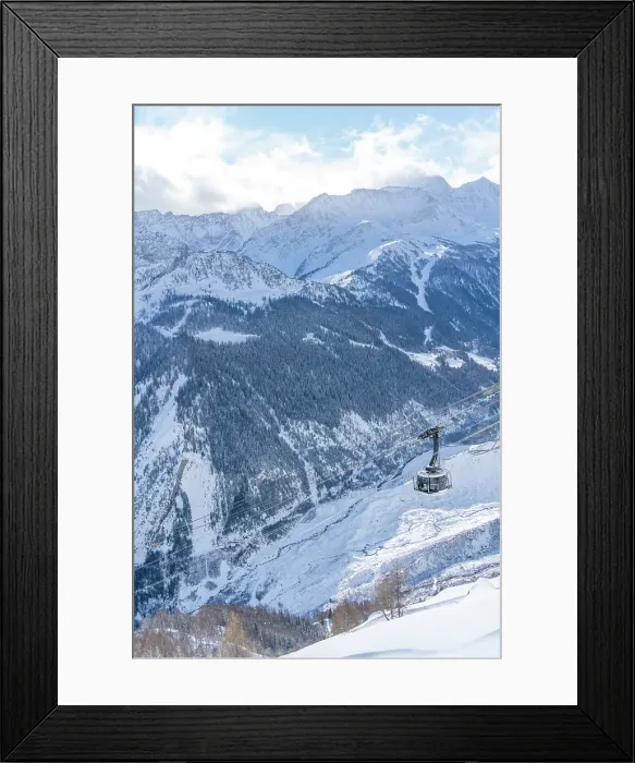 Framed Print : View of snow covered Aosta Valley, mountains and Skyway Monte Bianco cable car in winter, Courmayeur, Aosta Valley, Italian Alps, Italy Framed Print : View of snow covered Aosta Valley, mountains and Skyway Monte Bianco cable car in winter, Courmayeur, Aosta Valley, Italian Alps, Italy