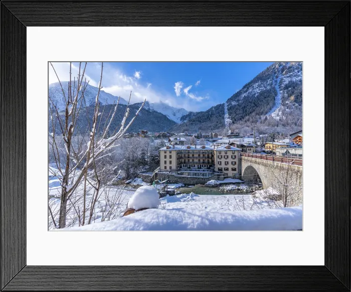 Framed Print : View of snow covered trees, mountains and Dolonne from Courmayeur in winter, Courmayeur, Aosta Valley, Italian Alps, Italy