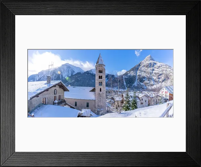 Framed Print : View of snow covered mountains, rooftops and Church of Saint Pantalon in Courmayeur in winter, Courmayeur, Aosta Valley, Italian Alps, Italy Framed Print : View of snow covered mountains, rooftops and Church of Saint Pantalon in Courmayeur in winter, Courmayeur, Aosta Valley, Italian Alps, Italy