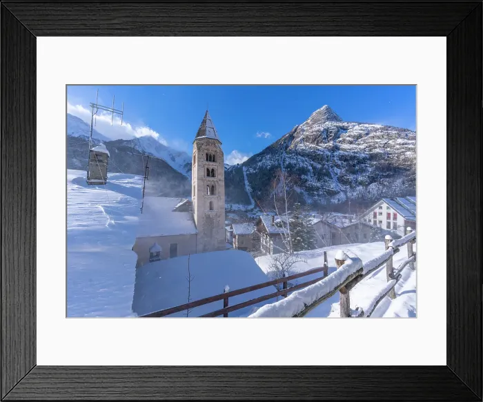 Framed Print : View of snow covered mountains, rooftops and Church of Saint Pantalon in Courmayeur in winter, Courmayeur, Aosta Valley, Italian Alps, Italy Framed Print : View of snow covered mountains, rooftops and Church of Saint Pantalon in Courmayeur in winter, Courmayeur, Aosta Valley, Italian Alps, Italy
