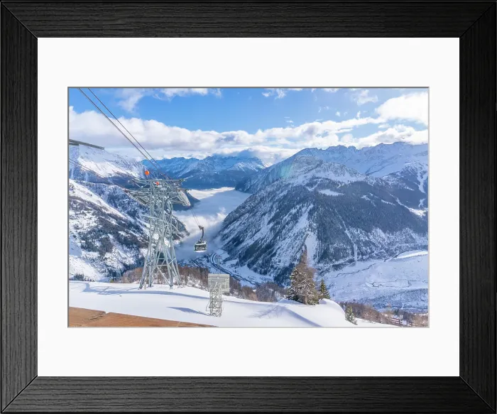 Framed Print : View of snow covered Aosta Valley, mountains and Skyway Monte Bianco cable car in winter, Courmayeur, Aosta Valley, Italian Alps, Italy Framed Print : View of snow covered Aosta Valley, mountains and Skyway Monte Bianco cable car in winter, Courmayeur, Aosta Valley, Italian Alps, Italy