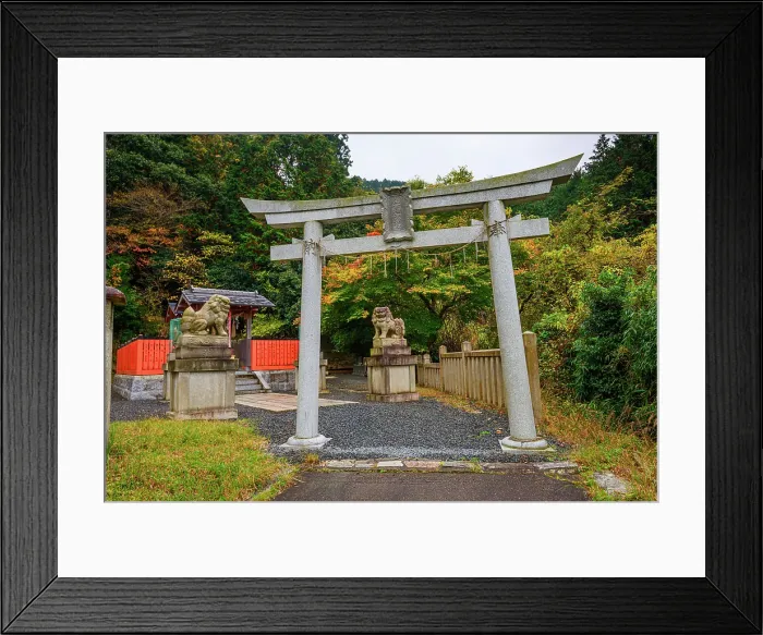 Framed Print : Traditional Shinto torii gate with guardian lion-dog statues surrounded by autumn foliage on Mount Hiei, near Kyoto, Honshu, Japan