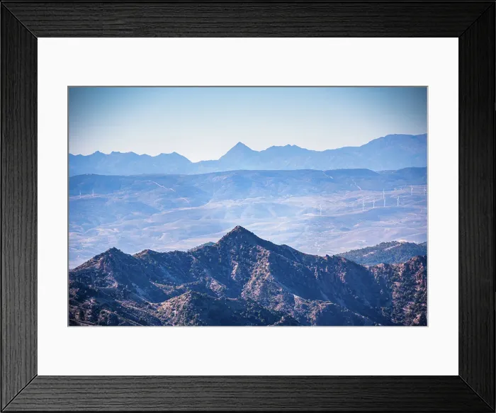 Framed Print : Distant view of layered mountain ranges of Sierra Nevda and Sierras de Tejeda, Almijara y Alhama align, with a prominent peak, Andalusia, Spain Framed Print : Distant view of layered mountain ranges of Sierra Nevda and Sierras de Tejeda, Almijara y Alhama align, with a prominent peak, Andalusia, Spain