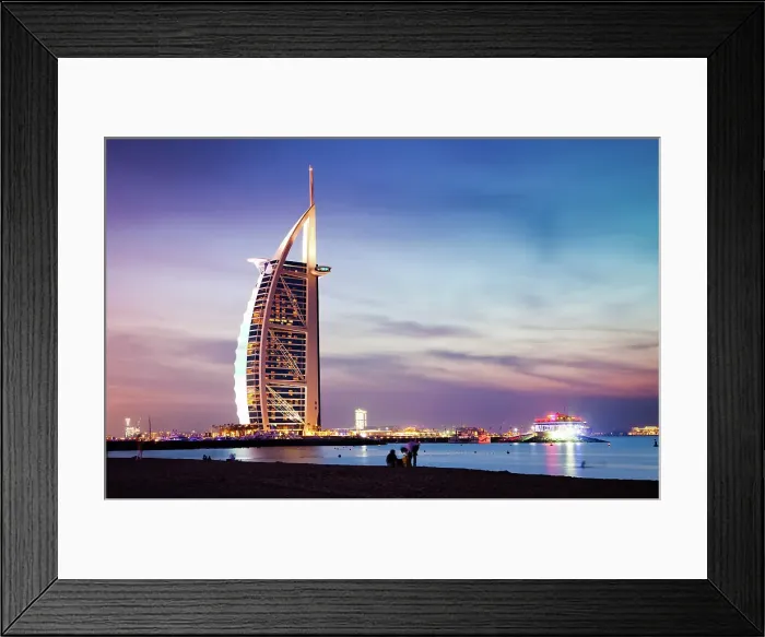 Framed Print : The world's first seven stars luxury hotel Burj Al Arab at night seen from Jumeirah public beach in Dubai, United Arab Emirates Framed Print : The world's first seven stars luxury hotel Burj Al Arab at night seen from Jumeirah public beach in Dubai, United Arab Emirates
