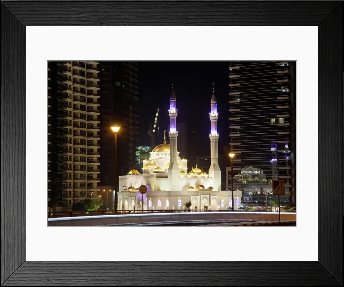 Framed Print : View of mosque and modern skyscrapers at night in Dubai Marina in Dubai, United Arab Emirates Framed Print : View of mosque and modern skyscrapers at night in Dubai Marina in Dubai, United Arab Emirates