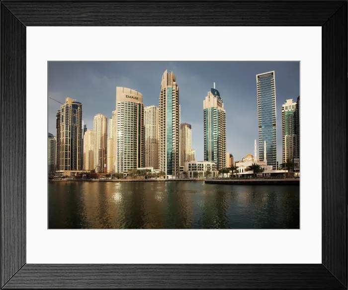 Framed Print : View of modern skyscrapers shining in sunrise light in Dubai Marina in Dubai, Dubai, United Arab Emirates Framed Print : View of modern skyscrapers shining in sunrise light in Dubai Marina in Dubai, Dubai, United Arab Emirates