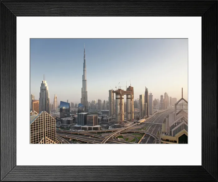 Framed Print : Dubai skyline at sunset with Burj Khalifa, the world tallest building and Sheikh Zayed road traffic, Dubai, United Arab Emirates