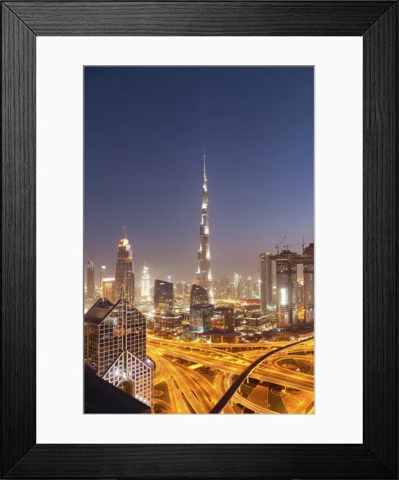 Framed Print : Dubai skyline at sunset with Burj Khalifa, the world tallest building and Sheikh Zayed road traffic, Dubai, United Arab Emirates Framed Print : Dubai skyline at sunset with Burj Khalifa, the world tallest building and Sheikh Zayed road traffic, Dubai, United Arab Emirates