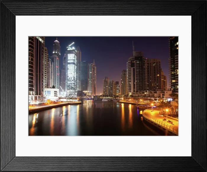 Framed Print : View of modern skyscrapers at night in Dubai Marina in Dubai, United Arab Emirates Framed Print : View of modern skyscrapers at night in Dubai Marina in Dubai, United Arab Emirates