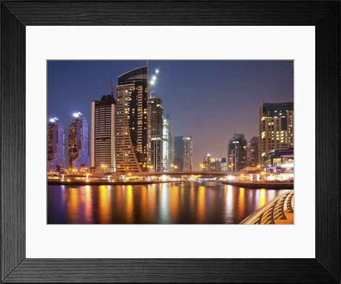 Framed Print : Colorful evening on canal and promenade in Dubai Marina, Dubai, United Arab Emirates Framed Print : Colorful evening on canal and promenade in Dubai Marina, Dubai, United Arab Emirates