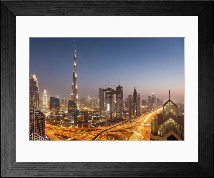 Framed Print : Dubai skyline at sunset with Burj Khalifa, the world tallest building and Sheikh Zayed road traffic, Dubai, United Arab Emirates Framed Print : Dubai skyline at sunset with Burj Khalifa, the world tallest building and Sheikh Zayed road traffic, Dubai, United Arab Emirates