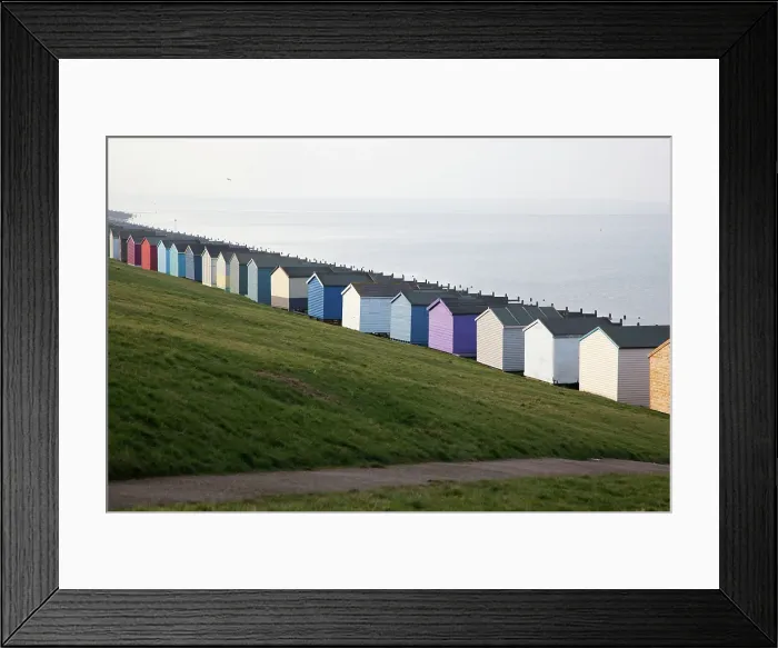 Framed Print : Colored beach huts on the beach of Tankerton near Whitstable in Kent, England, United Kingdom Framed Print : Colored beach huts on the beach of Tankerton near Whitstable in Kent, England, United Kingdom