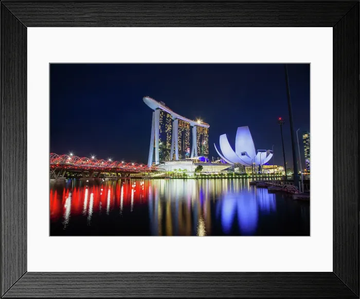 Framed Print : Skyline of Singapore Marina Bay at night with Marina Bay Sands and Art Science museum reflecting in a pond after rain, Singapore Framed Print : Skyline of Singapore Marina Bay at night with Marina Bay Sands and Art Science museum reflecting in a pond after rain, Singapore