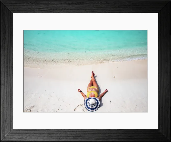 Framed Print : Woman with straw hat sunbathing on tropical beach, The Maldives, Indian Ocean Framed Print : Woman with straw hat sunbathing on tropical beach, The Maldives, Indian Ocean