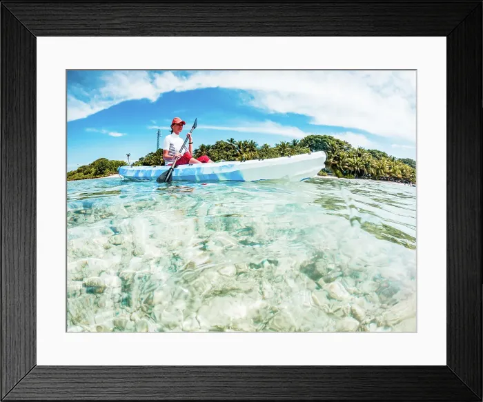 Framed Print : Woman kayaking in clear tropical sea, summer fun, The Maldives, Indian Ocean Framed Print : Woman kayaking in clear tropical sea, summer fun, The Maldives, Indian Ocean