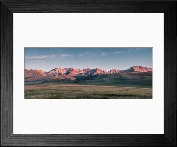 Framed Print : Panorama of sunset over snow-capped mountain range in the Song Kol lake area of Kyrgyzstan Framed Print : Panorama of sunset over snow-capped mountain range in the Song Kol lake area of Kyrgyzstan
