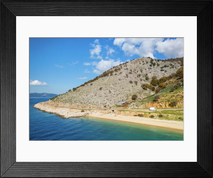 Framed Print : Drone view of camper van on a mountain road on the coast, Greece Framed Print : Drone view of camper van on a mountain road on the coast, Greece