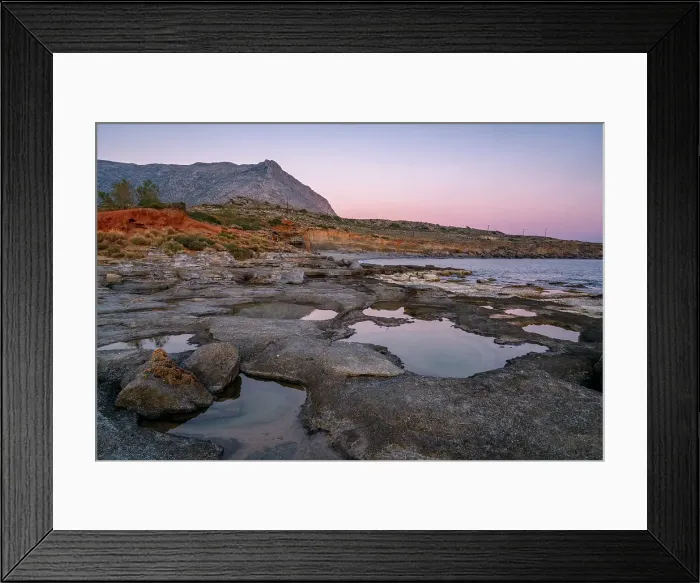 Framed Print : Aspes beach, natural holes in the rocks full of water at sunset, with sea in the background, Greece Framed Print : Aspes beach, natural holes in the rocks full of water at sunset, with sea in the background, Greece