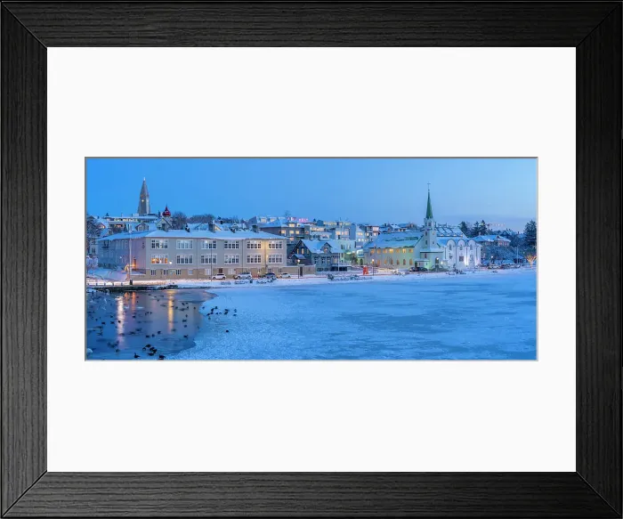 Framed Print : View of waterfront buildings and city skyline in background in the city centre of Reykjavik at dusk in winter, Reykjavik, Iceland Framed Print : View of waterfront buildings and city skyline in background in the city centre of Reykjavik at dusk in winter, Reykjavik, Iceland