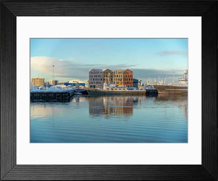 Framed Print : View of colourful buildings around Hafnarfjorour Marina reflecting in water in winter, Hafnarfjorour, Iceland Framed Print : View of colourful buildings around Hafnarfjorour Marina reflecting in water in winter, Hafnarfjorour, Iceland