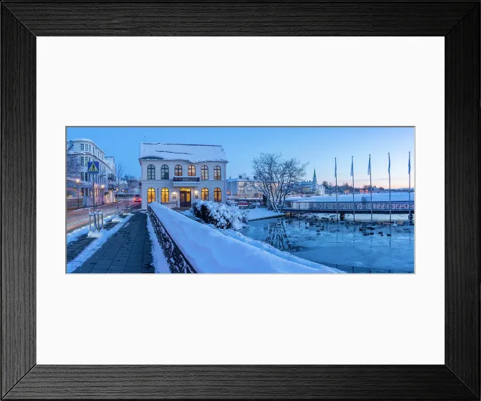 Framed Print : View of ornate buildings of Reykjavik from Tjornin lake at dusk in winter, Reykjavik, Iceland Framed Print : View of ornate buildings of Reykjavik from Tjornin lake at dusk in winter, Reykjavik, Iceland