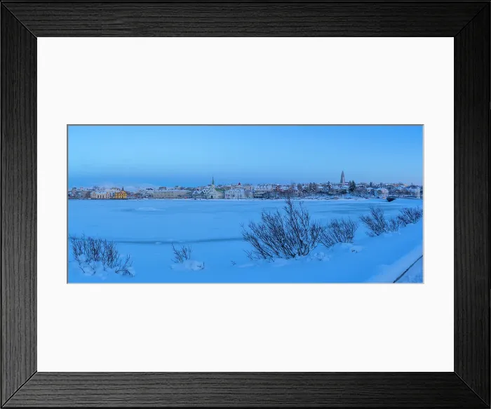 Framed Print : View of the city skyline of Reykjavik from Tjornin lake at sunset in winter, Reykjavik, Iceland