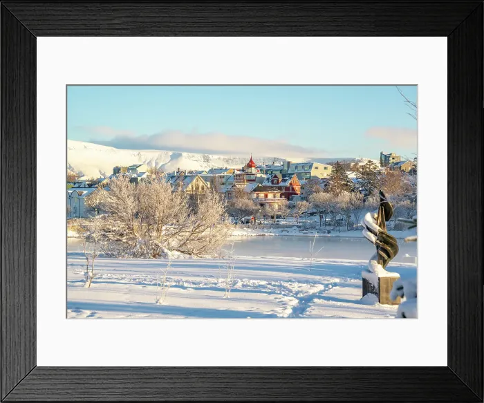 Framed Print : View of Tjornin park, town and mountains on a sunny day in winter, Reykjavik, Iceland Framed Print : View of Tjornin park, town and mountains on a sunny day in winter, Reykjavik, Iceland