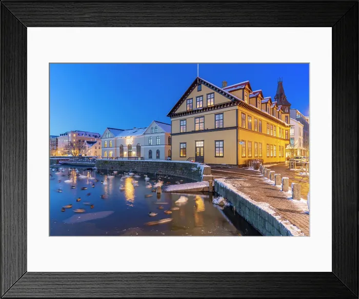 Framed Print : View of waterfront buildings and City Hall in background in the city centre of Reykjavik at dusk in winter, Reykjavik, Iceland Framed Print : View of waterfront buildings and City Hall in background in the city centre of Reykjavik at dusk in winter, Reykjavik, Iceland
