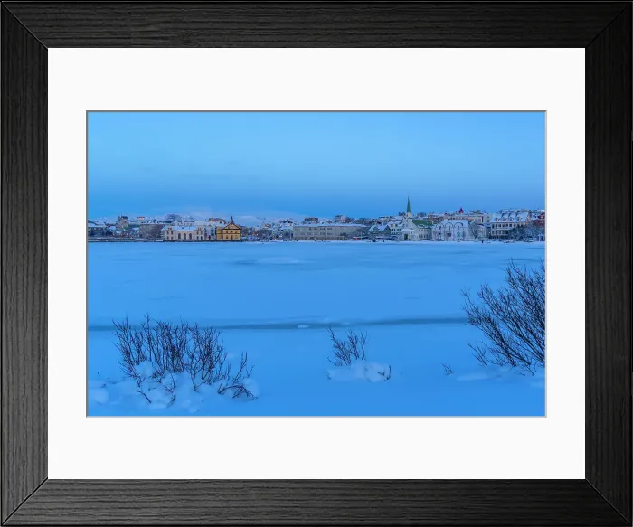 Framed Print : View of the city skyline of Reykjavik from Tjornin lake at sunset in winter, Reykjavik, Iceland