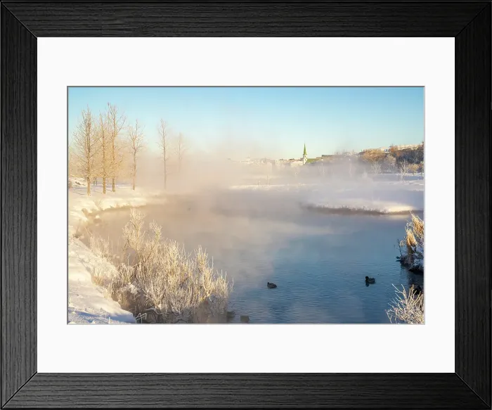 Framed Print : View of morning mist in Tjornin park and Lutheran Free Church on a sunny day in winter, Reykjavik, Iceland Framed Print : View of morning mist in Tjornin park and Lutheran Free Church on a sunny day in winter, Reykjavik, Iceland