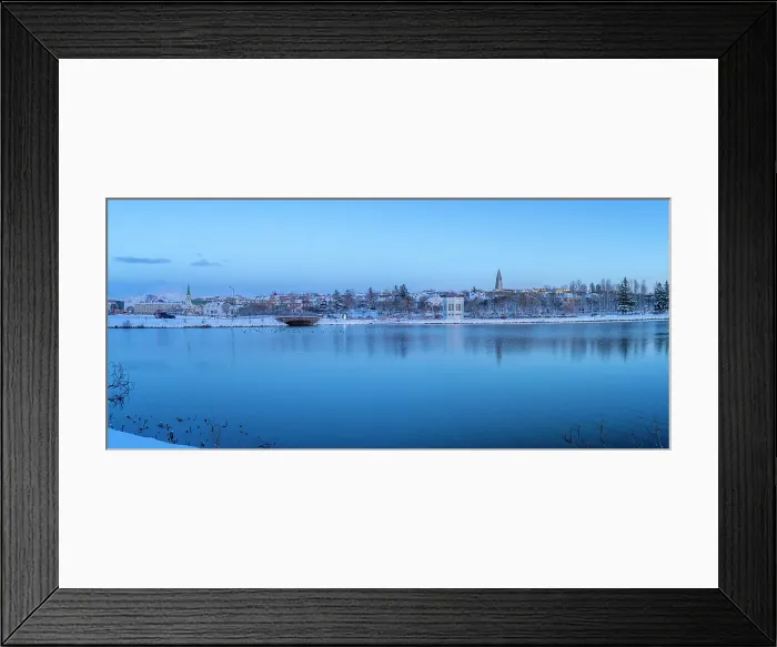Framed Print : View of the city skyline of Reykjavik from Tjornin lake at sunset in winter, Reykjavik, Iceland Framed Print : View of the city skyline of Reykjavik from Tjornin lake at sunset in winter, Reykjavik, Iceland