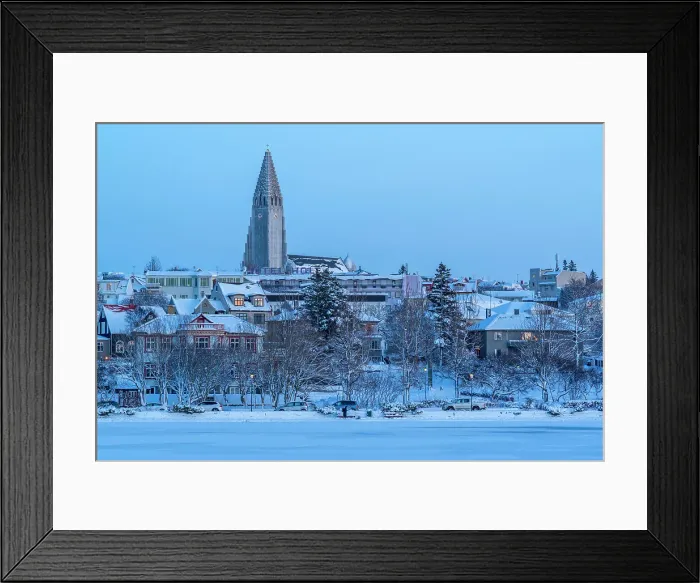 Framed Print : View of the Hallgrimskirkja Church and city skyline of Reykjavik from Tjornin lake at sunset in winter, Reykjavik, Iceland Framed Print : View of the Hallgrimskirkja Church and city skyline of Reykjavik from Tjornin lake at sunset in winter, Reykjavik, Iceland