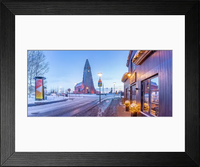 Framed Print : View of restaurant in the city centre and Hallgrimskirkja church at dusk in winter, Reykjavik, Iceland Framed Print : View of restaurant in the city centre and Hallgrimskirkja church at dusk in winter, Reykjavik, Iceland